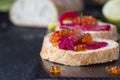 Ciabatta with beet Gravlax salmon with caviar Royalty Free Stock Photo