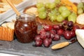 Appetizer Display Grapes, French Cheeses and Jam