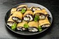 Appetizer - eggplant rolls stuffed with creme cheese, garlic and greens.