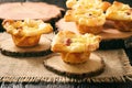 Appetizer -mini pies with mashed potatoes, bacon and cheese.