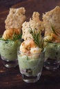 Appetizer party snacks in glasses, avocado cream guacamole with Royalty Free Stock Photo