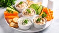 Appetizer platter with dips, fresh vegetables, and toasted bread slices Royalty Free Stock Photo