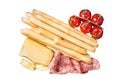 Appetizer platter with grissini bread sticks, salami, tomato and parmesan cheese. Isolated, white background. Royalty Free Stock Photo