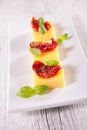 Appetizer, polenta and tomato Royalty Free Stock Photo