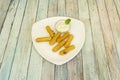 Appetizer portion with fried mozzarella sticks Royalty Free Stock Photo