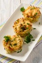 Appetizer - potato muffins with chicken meat and cheese. Royalty Free Stock Photo