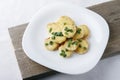 Appetizer of potatoes, cheese and green onions. There is room for text Royalty Free Stock Photo