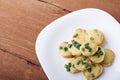 Appetizer of potatoes, cheese and green onions. There is room for text Royalty Free Stock Photo