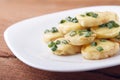 Appetizer of potatoes, cheese and green onions. There is room for text Royalty Free Stock Photo