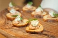 Appetizer on a wooden tray Royalty Free Stock Photo