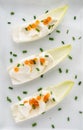 Appetizer with salad, cheese and salmon eggs Royalty Free Stock Photo