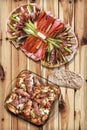 Appetizer Savory Dish With Grilled Minced Meat Loafs Cevapcici And Chicken Thighs Served On Rustic Knotted Pine Wood Table