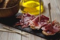 Appetizer Serrano ham with toasted bread Royalty Free Stock Photo