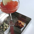 Appetizer with strawberry margarita