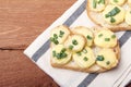 Appetizer of wheat bread, potatoes, cheese and green onions Royalty Free Stock Photo