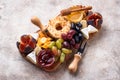 Appetizer for wine, cheese plate with grapes and figs