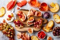 Appetizers, antipasti snacks and rose wine in glasses. Bruschetta or authentic traditional spanish tapas set, cheese and meat Royalty Free Stock Photo