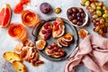 Appetizers, antipasti snacks and rose wine in glasses. Bruschetta or authentic traditional spanish tapas set, cheese and meat Royalty Free Stock Photo