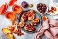 Appetizers, antipasti snacks and rose wine in glasses. Bruschetta or authentic traditional spanish tapas set, cheese and meat Royalty Free Stock Photo