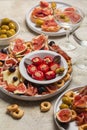 Appetizers, antipasti, snacks and vermouth cocktail. Bruschetta, cold cuts Royalty Free Stock Photo