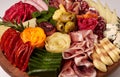 Appetizers boards with assorted cheese, salami, ham, grape and nuts. Charcuterie and cheese platter. Top view. Isolated