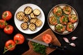 Appetizers- grilled eggplants with tomatoes, garlic and dill. Royalty Free Stock Photo