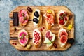 Appetizers table with italian antipasti snacks. Brushetta or authentic traditional spanish tapas set Royalty Free Stock Photo