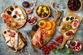 Appetizers table with italian antipasti snacks. Brushetta or authentic traditional spanish tapas set, cheese variety board Royalty Free Stock Photo