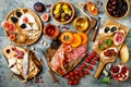 Appetizers table with italian antipasti snacks and wine in glasses. Brushetta or authentic traditional spanish tapas set Royalty Free Stock Photo