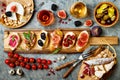 Appetizers table with italian antipasti snacks and wine in glasses. Brushetta or authentic traditional spanish tapas set Royalty Free Stock Photo