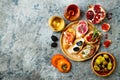 Appetizers table with italian antipasti snacks and wine in glasses. Brushetta or authentic traditional spanish tapas set Royalty Free Stock Photo