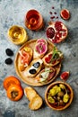 Appetizers table with italian antipasti snacks and wine in glasses. Brushetta or authentic traditional spanish tapas set Royalty Free Stock Photo