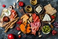 Appetizers table with italian antipasti snacks and wine in glasses. Brushetta or authentic traditional spanish tapas set Royalty Free Stock Photo