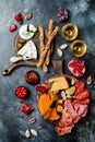 Appetizers table with italian antipasti snacks and wine in glasses. Brushetta or authentic traditional spanish tapas set Royalty Free Stock Photo