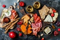 Appetizers table with antipasti snacks and wine in glasses. Bruschetta or authentic traditional spanish tapas set, cheese and meat Royalty Free Stock Photo