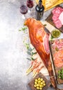 Appetizers table with spanish iberian whole ham jamon serrano, snacks, olives and red and rose wine. Flate lay. Top view Royalty Free Stock Photo