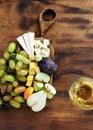 Appetizers table wine Fruit cheese wooden board Royalty Free Stock Photo