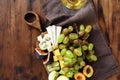 Appetizers table wine Fruit cheese wooden board Royalty Free Stock Photo