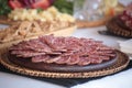 Salami appetizers at the wedding lunch typical products Royalty Free Stock Photo