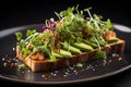 An appetizing avocado toast with garnish of microgreens and chili flakes