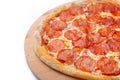 Appetizing background bright pepperoni pizza closeup filling the frame. Royalty Free Stock Photo