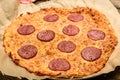 Appetizing background pepperoni pizza closeup filling the frame