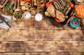 Barbecued steak, sausages, beer and grilled vegetables on wooden Royalty Free Stock Photo