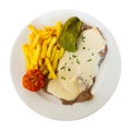 Appetizing beef steak with creamy Roquefort sauce