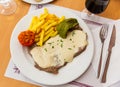 Appetizing beef steak with creamy Roquefort sauce