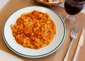 Appetizing braised beans with chorizo sausage pieces