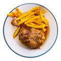 Appetizing braised pork knuckle served with of crispy french fries