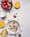 Appetizing breakfast with fresh strawberries, oatmeal, orange juice border ,place for text on wooden rustic background top view cl Royalty Free Stock Photo