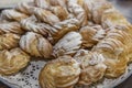 Appetizing cakes with icing sugar on a plate. Close-up Royalty Free Stock Photo