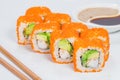 Appetizing California sushi rolls with rice, shrimps, avocado, c Royalty Free Stock Photo